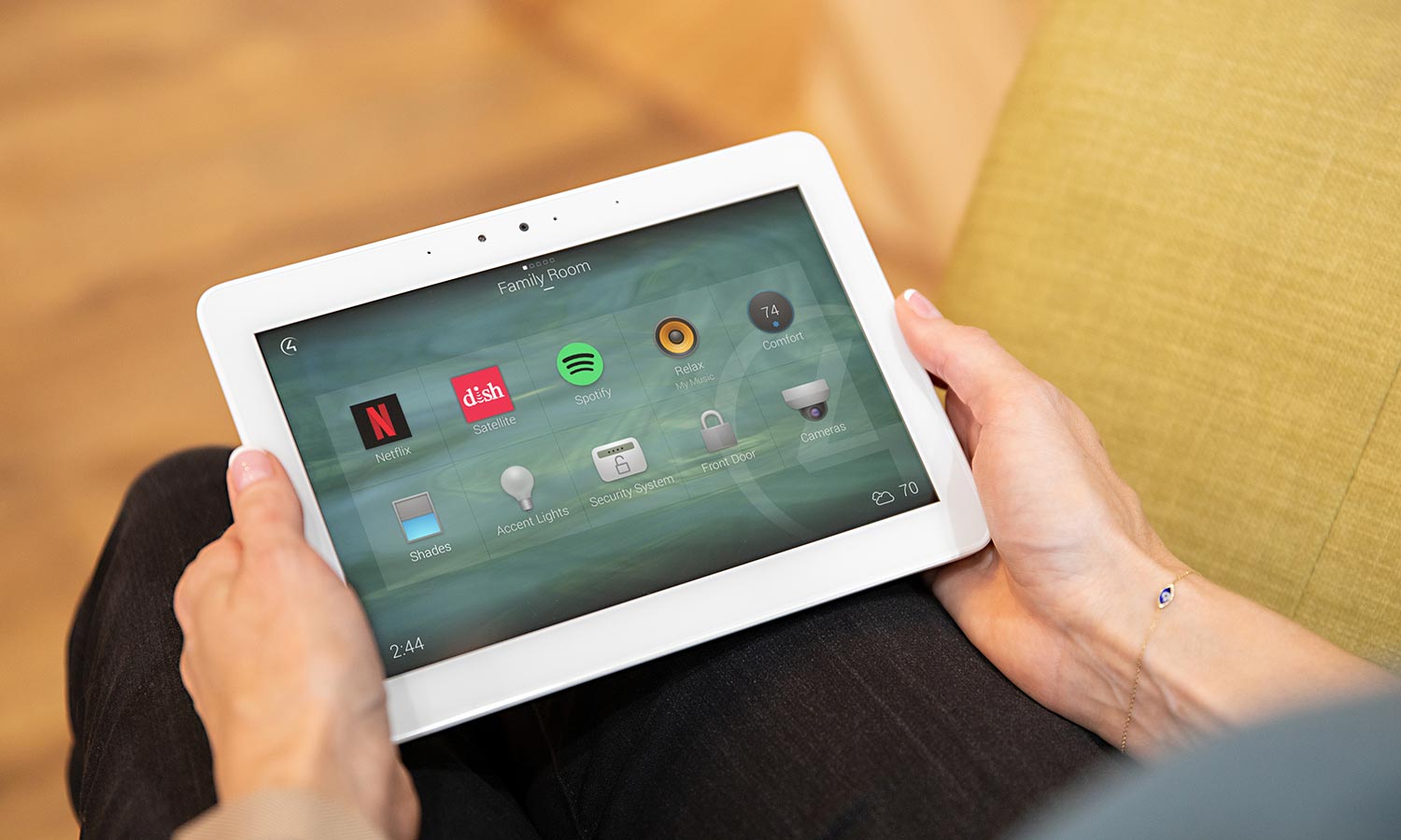 Control4 home automation interface on a tablet, showing a comprehensive control dashboard.
