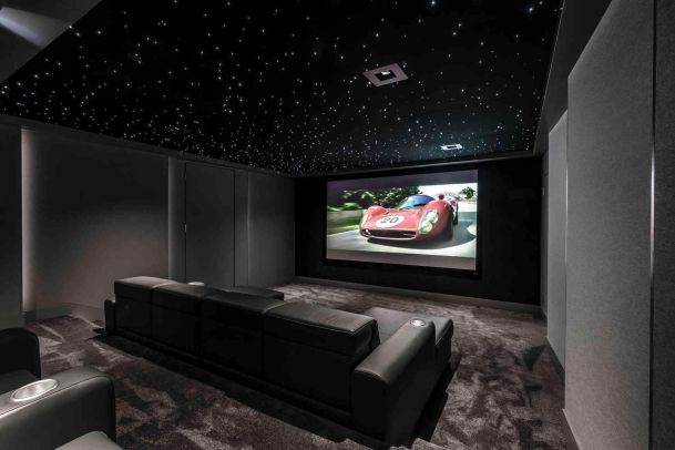 Black and grey dedicated Home Theater in Pacific Palisades