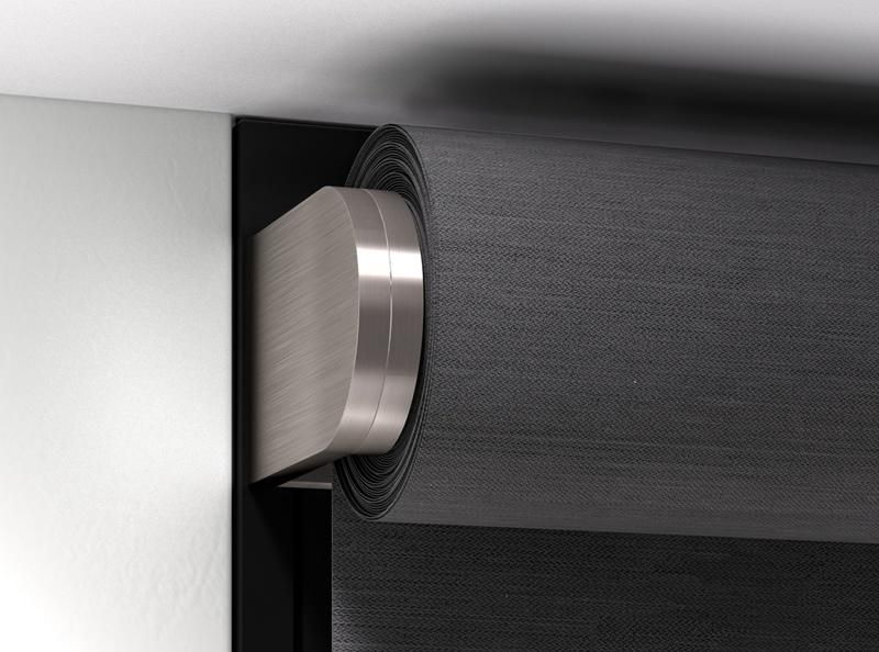 Close-up of a Lutron Palladiom roller shade mechanism in a metallic finish.