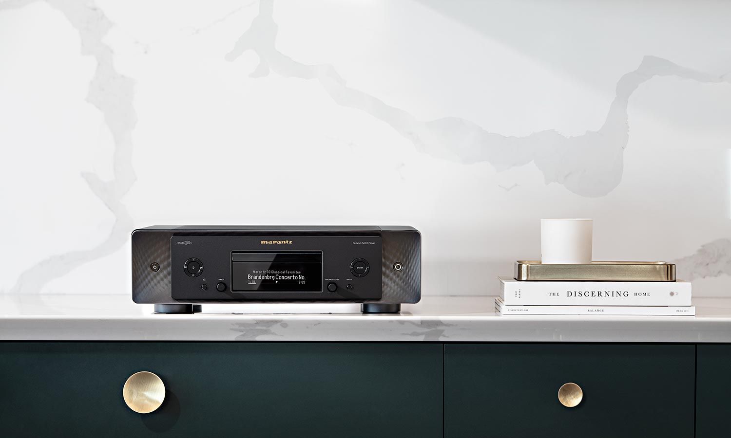 Marantz audio receiver displayed on a stylish console, highlighting its sleek design and high-end functionality.