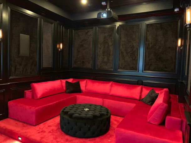 Black and bright red Home theater seating and projector in Encino