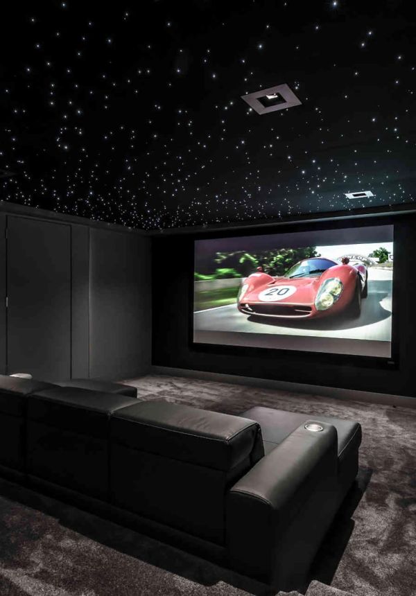 Dedicated home theater with theater seating and starlight ceiling
