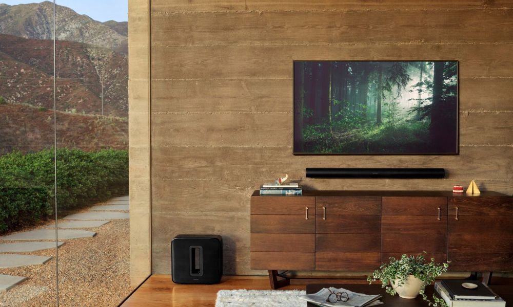 Living room Sonos surround sound with sound bar and subwoofer