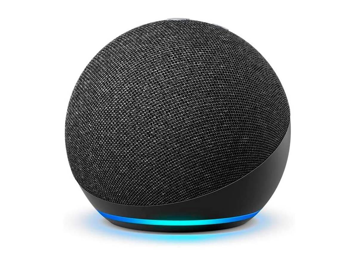 Amazon Echo Dot with glowing blue ring integrated with the Savant system for voice control.
