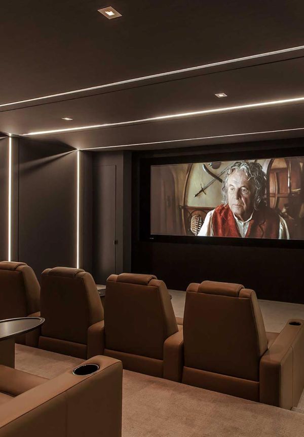 Whole home theater system in Santa Monica with theater seating and projector